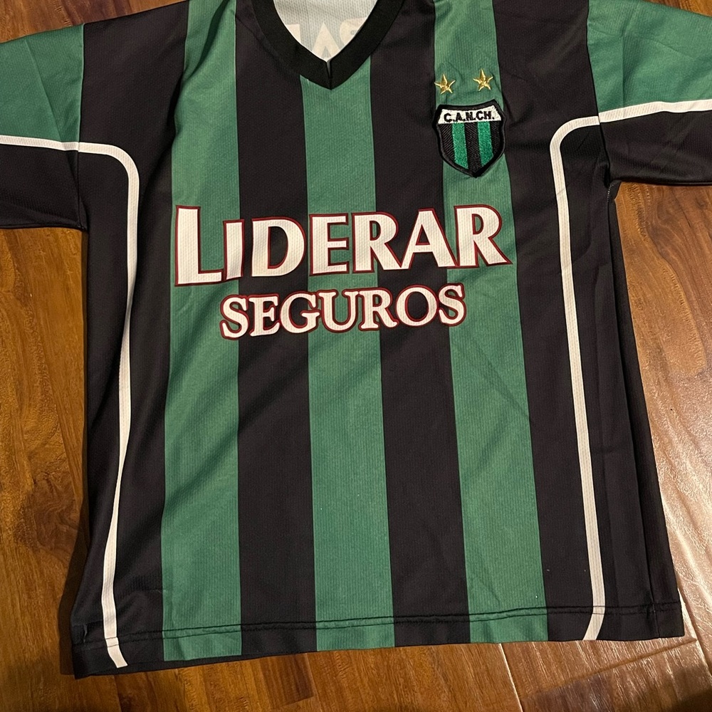 Striped green and black soccer jersey - see photos for measurements